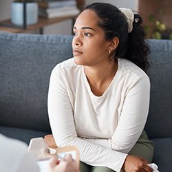 Woman staring off into the distance